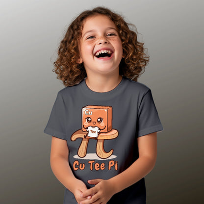 girl wearing charcoal Cu Tee Pi kids science t-shirt with cute copper cube sitting on pi symbol table